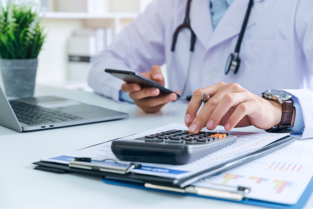 Doctor reviewing billing