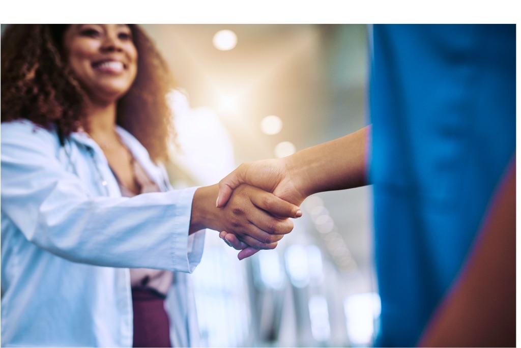 Doctor shaking hands with a patient
